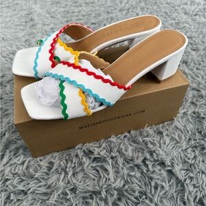 Matisse White Heeled Mules with Red, Blue, Yellow & Green Trim